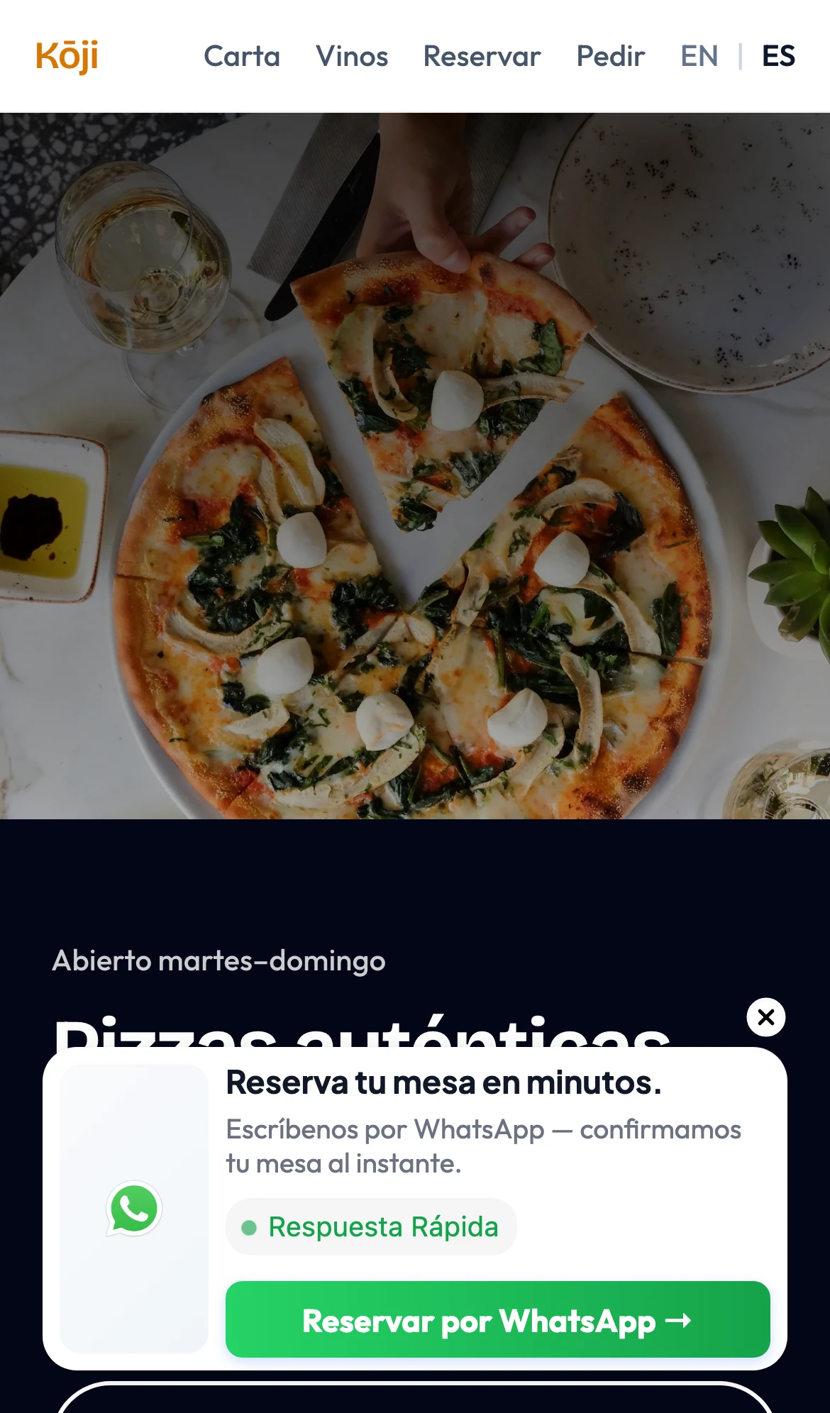 Sitio móvil de Kōji con popup de reserva por WhatsApp